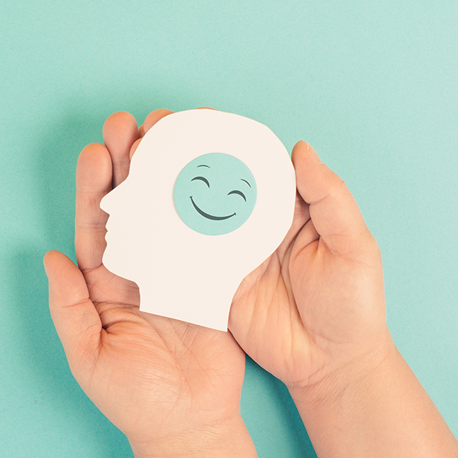 Hands holding a childrens toy